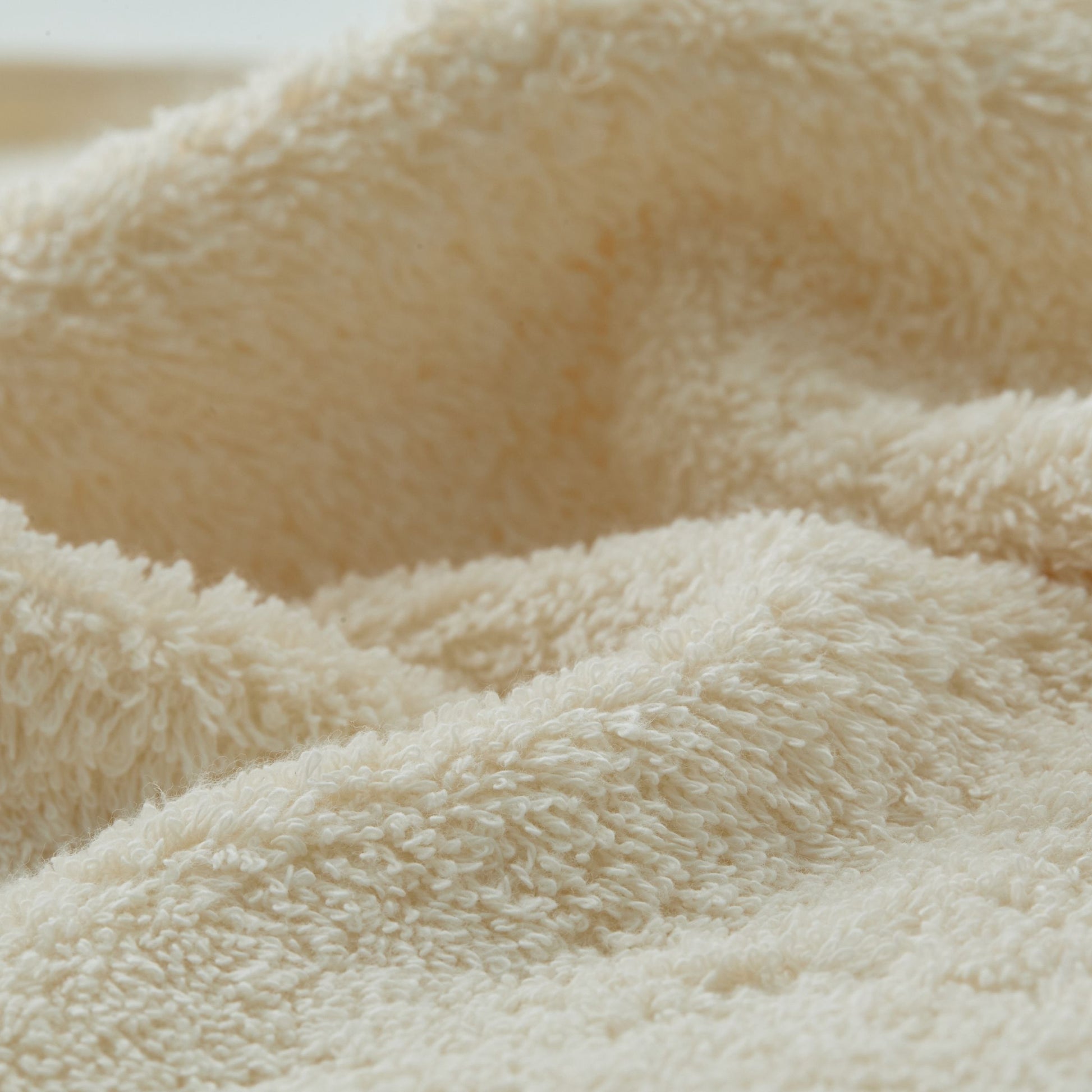 Close-up of beige Egyptian cotton textured fabric