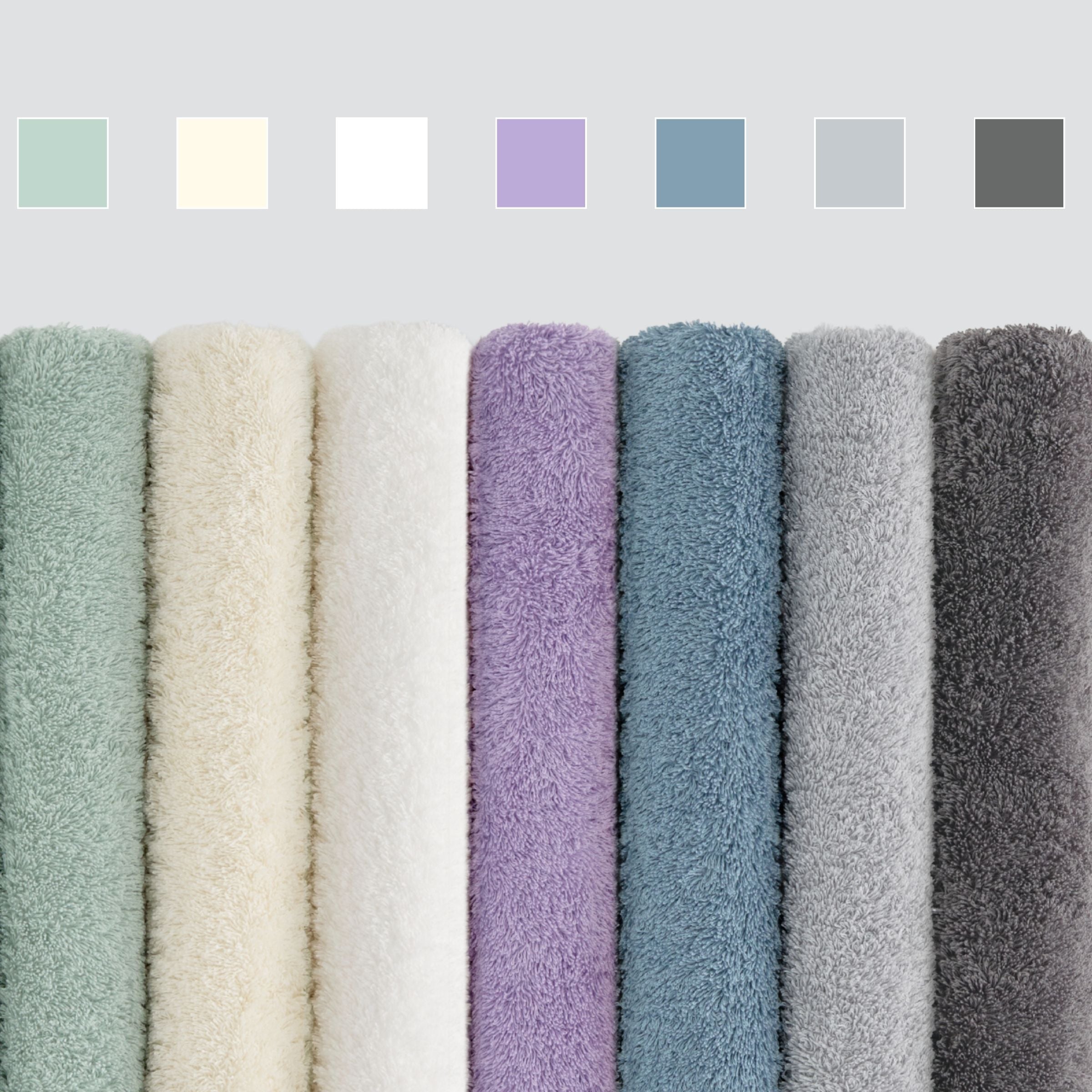 Row of textured towels in various colors 