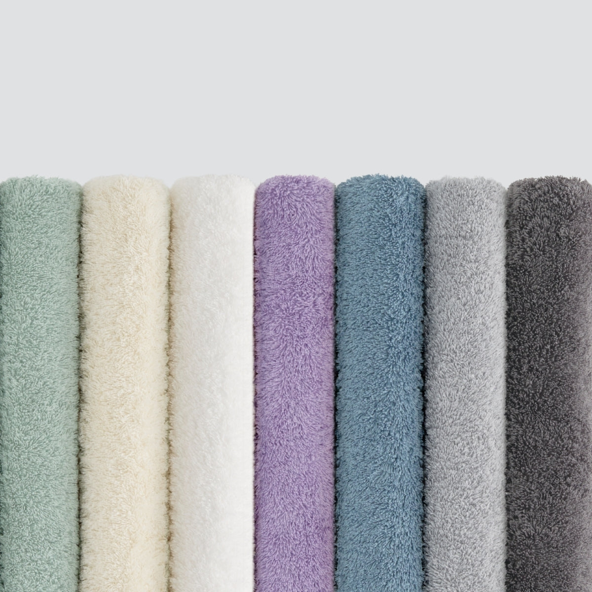 Row of textured fabric samples in various colors 