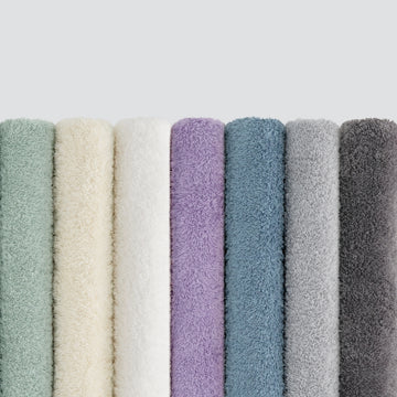 Row of textured fabric samples in various colors 