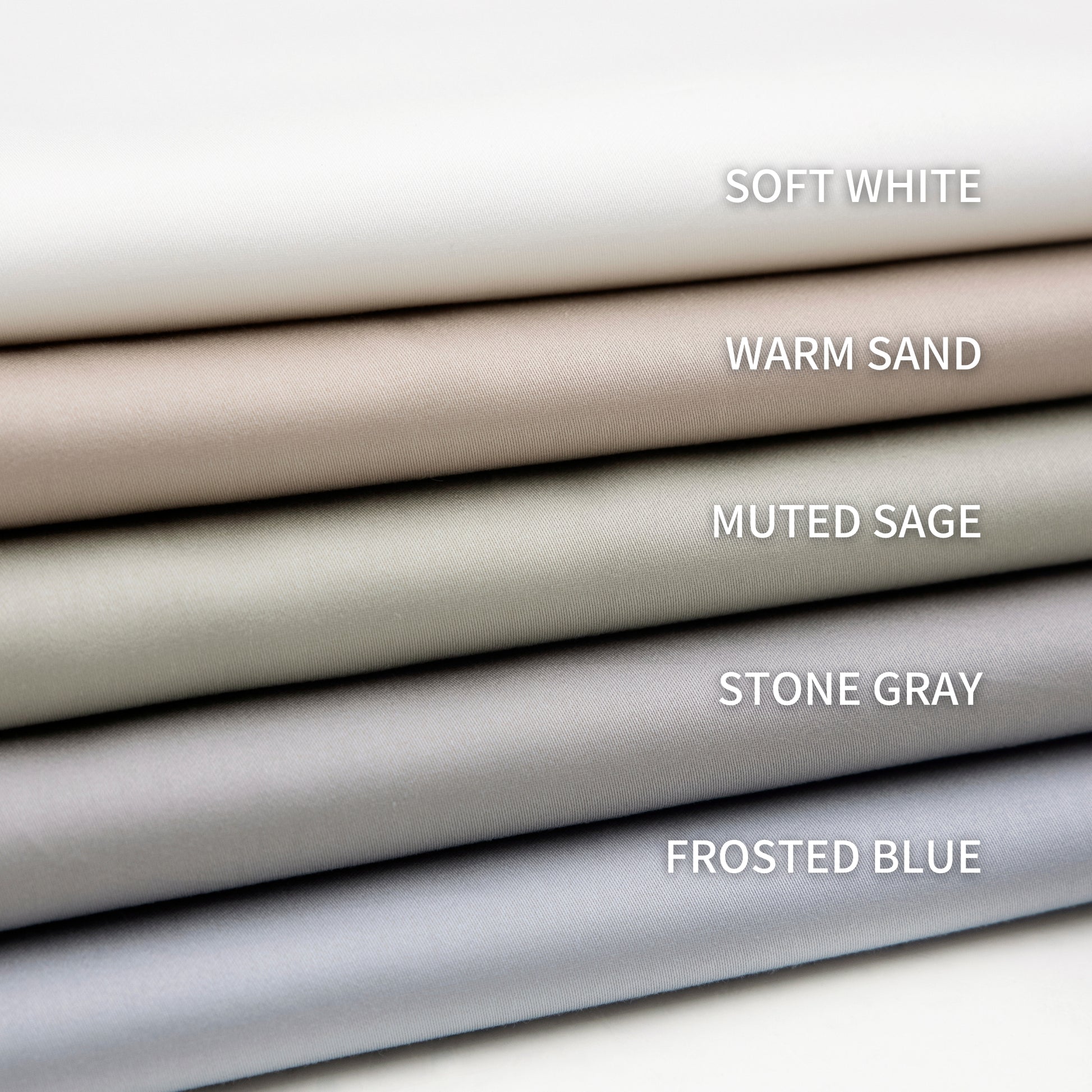Stack of fabric swatches labeled with color names