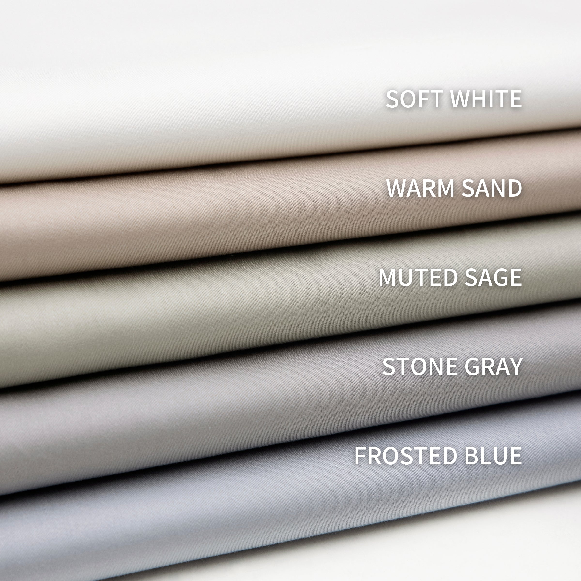 Stack of fabric swatches labeled with color names
